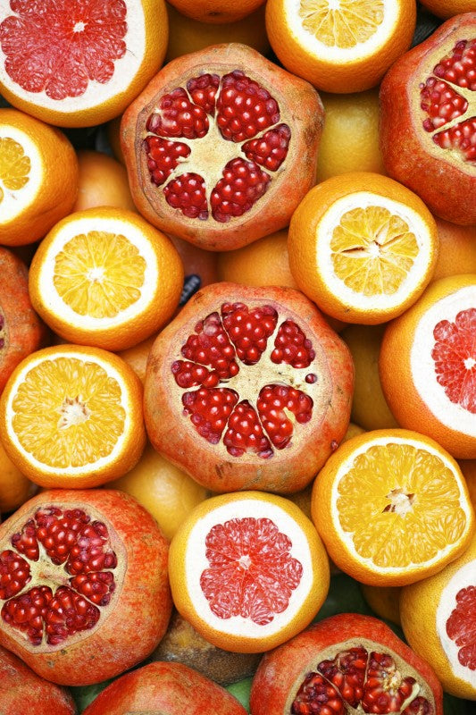 vitaminas de alimentos cítricos como la naranja o la granada